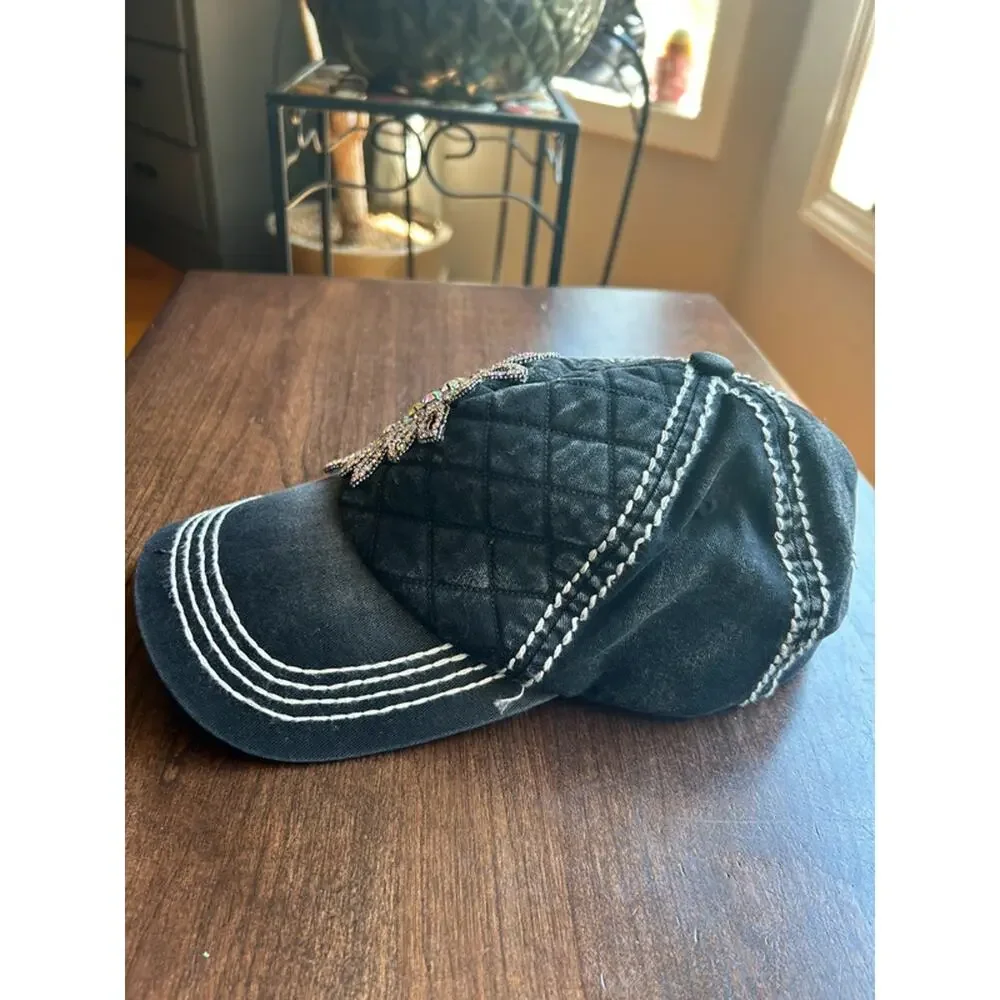 Olive & Pique quilted baseball cap featuring an iridescent rhinestone flower